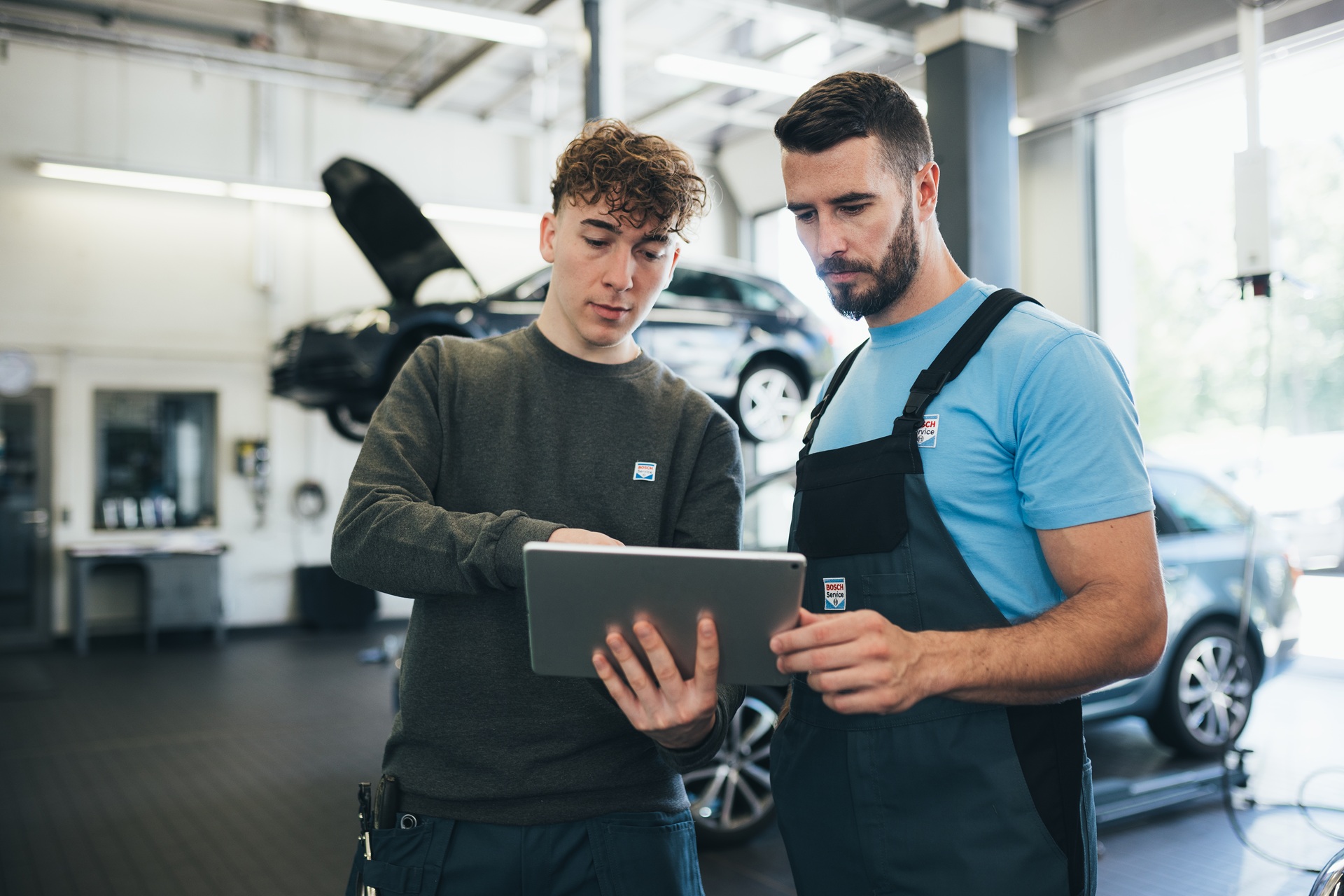 Bosch technicians reviewing vehicle data