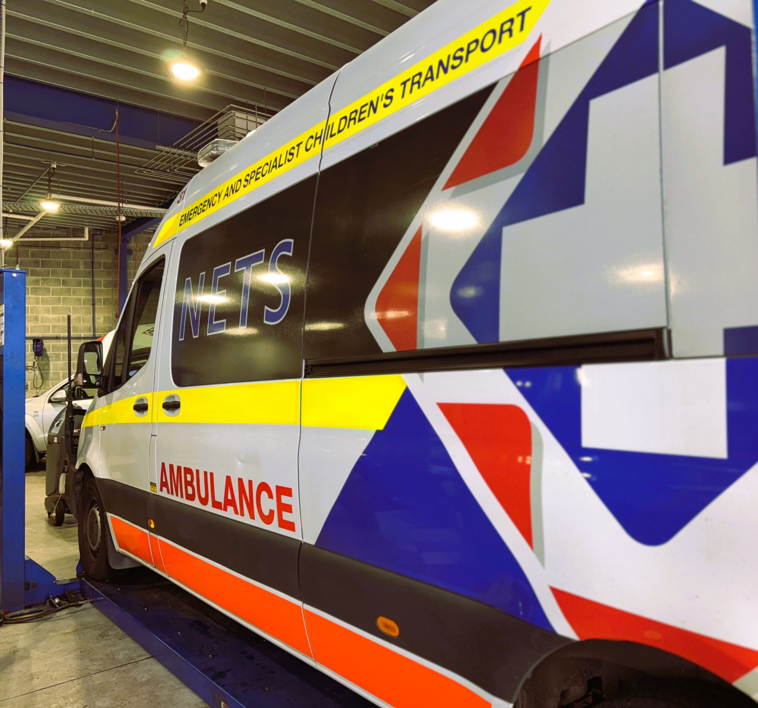 NETS Ambulance vehicle inside Bosch Car Service Milperra workshop